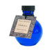 Blue round glass bottle of Olivia's Boudoir Seduction massage and body oil with decorative label tag.
