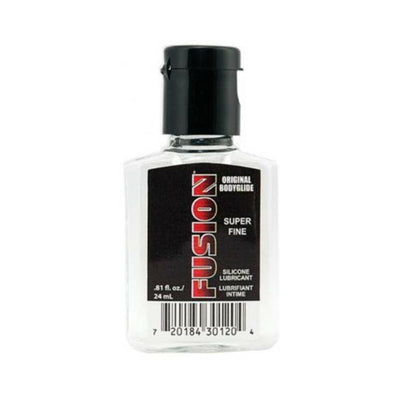 Small clear bottle of Fusion Original Bodyglide super fine silicone lubricant with black label and cap.