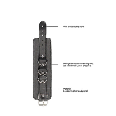 Black and white bonded leather wrist or ankle cuff with adjustable holes, metal D-rings, and buckle strap details.