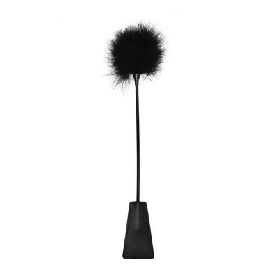 Black and white crop with a soft feather tickler on one end and a bonded leather paddle on the other.