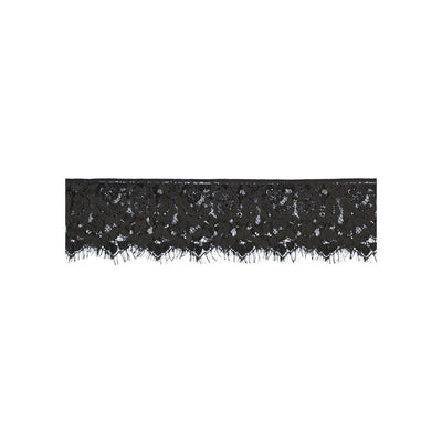 Black lace eye mask with intricate floral pattern and elastic straps for comfortable sensory play.