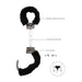 Black and white furry handcuffs with metal chain and lock, featuring quick-release button and keys for secure, comfortable use.