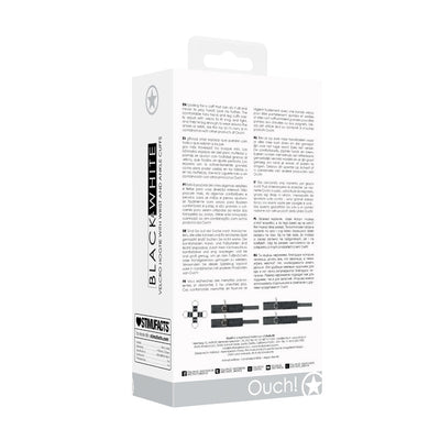 Packaging box of Ouch! Black & White Velcro Hogtie with wrist and ankle cuffs shown from the back with product details and images.