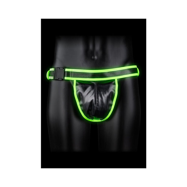 Black PU leather jockstrap with glowing green trim and adjustable buckle on a black mannequin.
