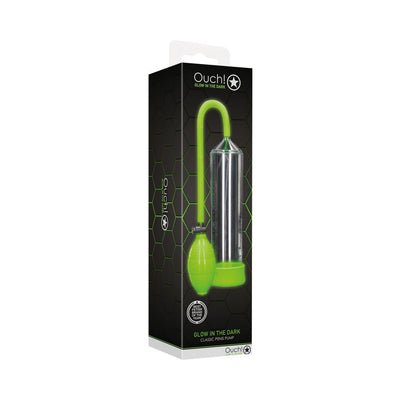 Ouch! Glow Classic Penis Pump in green with glow-in-the-dark feature displayed in black hexagon-patterned packaging.