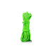 Coiled bright green glow-in-the-dark rope with smooth texture, designed for versatile use.