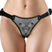 Close-up of a metallic gray adjustable strap-on harness with black straps worn on hips.