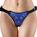 Close-up of a blue metallic strap-on harness with adjustable black straps and metal rings on a model's hips.