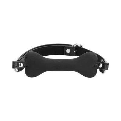 Black silicone bone-shaped gag with adjustable bonded leather strap and metal buckle closure.