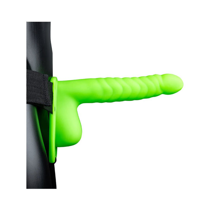 Bright green ribbed hollow strap-on with balls and adjustable black waistband displayed on mannequin.