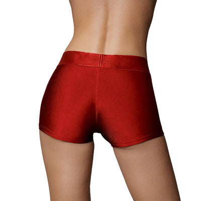 Back view of a person wearing red vibrating strap-on boxer shorts with a smooth, fitted design.