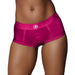 Pink mid-rise vibrating strap-on brief with a front O-ring opening, worn on a model's hips.
