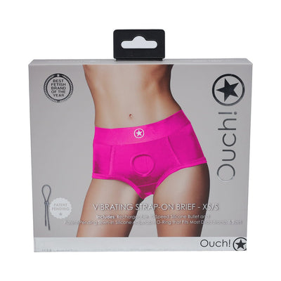 Packaging of Ouch! Vibrating Strap-on Brief in bright pink, featuring a mid-rise fuller cut design with a patent-pending adjustable O-ring system.