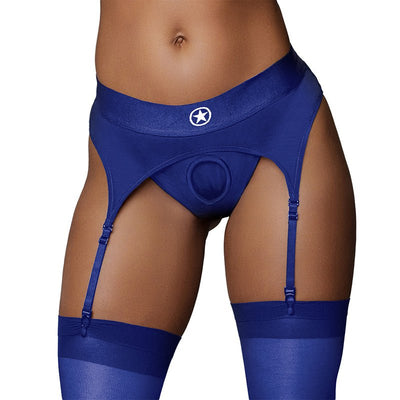 Royal blue vibrating strap-on thong with adjustable garters and matching thigh-high stockings on model.