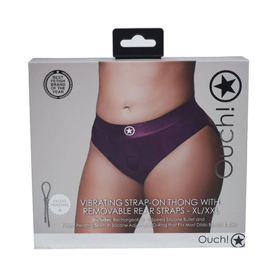Packaging of Ouch! Vibrating Strap-on Thong in purple, shown worn on a model, highlighting removable rear straps and adjustable fit.