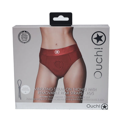 Packaging of Ouch! Vibrating Strap-on Thong in red with removable rear straps, size XS/S, featuring a model wearing the thong.