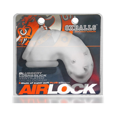 Airlock Air-Lite vented chastity cage in soft white silicone with ventilation holes, displayed in branded packaging.