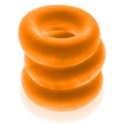 Three stacked bright orange jumbo cockrings made of soft, stretchy material with a smooth finish.