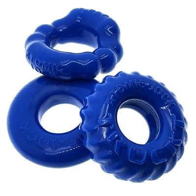 Three blue textured flexible cockrings from Oxballs Bonemaker 3-pack kit displayed on a white background.