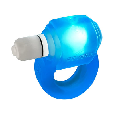 Blue translucent silicone cock ring with integrated LED light and removable white bullet vibrator.