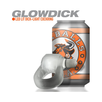 Clear silicone Glowdick cockring with LED light shown next to an orange and silver Oxballs branded can.