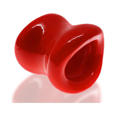 Red glossy ergonomic ballstretcher with hourglass shape and oval inner opening for comfortable fit and stretch.