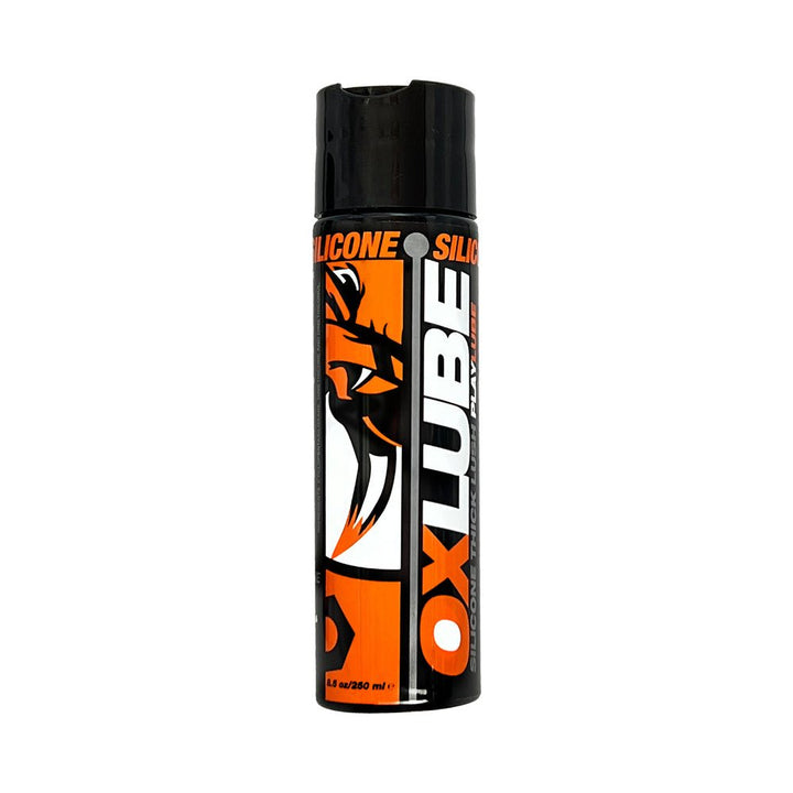 Bottle of Oxballs Thick Silicone Oxlube with black and orange label and black cap, 8.4 oz size.