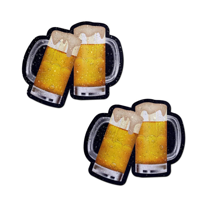 Pair of beer mug shaped nipple pasties with frothy foam and bubbles design on a white background.