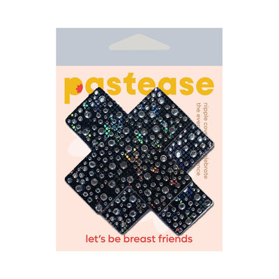 Black sparkling crystal cross-shaped nipple pasties on branded Pastease packaging with tagline let's be breast friends