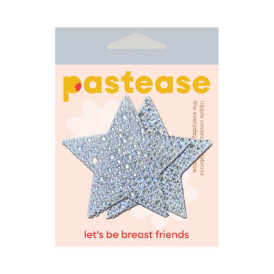Silver star-shaped nipple pasties adorned with sparkling crystals on branded Pastease packaging.