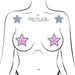 Illustration of silver glitter star-shaped nipple pasties with pink centers on a female torso outline.