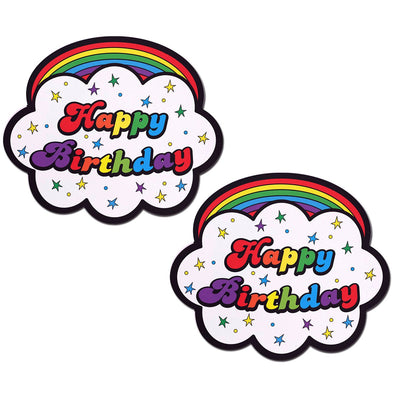 Pair of cloud-shaped nipple pasties with rainbow arches and colorful "Happy Birthday" text surrounded by stars and dots.