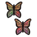 Pair of glittery pastel rainbow butterfly-shaped nipple pasties with black outlines on white background