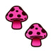 Pair of neon pink mushroom-shaped nipple pasties with black spots and textured finish on a white background.