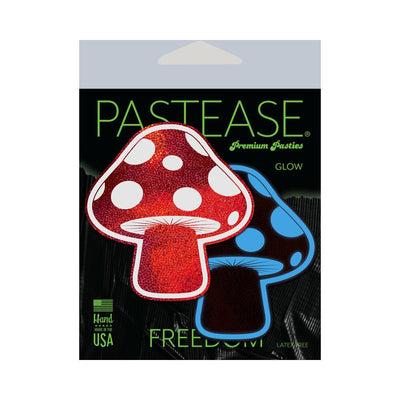 Pastease Mushroom shiny red and white polka dot glow-in-the-dark nipple pasties packaging with black background.