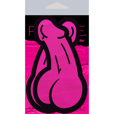 Pair of neon pink novelty nipple pasties shaped like stylized penises with black outlines on branded packaging.