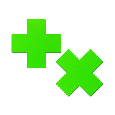 Pair of neon green day-glow lycra cross-shaped nipple pasties on white background