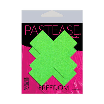 Pastease Plus X neon green day-glow lycra cross nipple pasties in black and pink packaging, handmade in the USA.