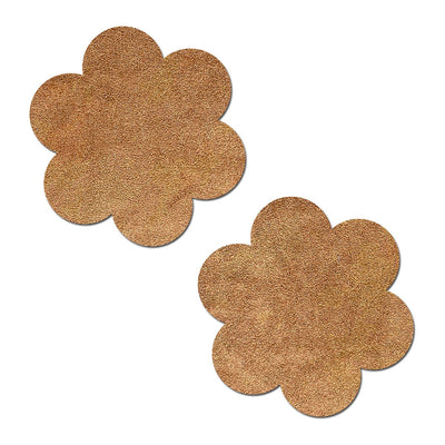Pair of cream-colored suede flower-shaped reusable nipple pasties with a soft, textured finish.