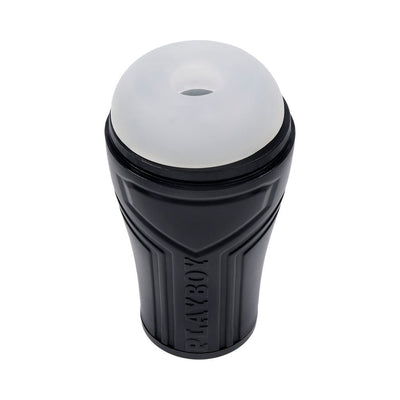 Black textured canister stroker with soft white removable sleeve and PLAYBOY branding on the side.