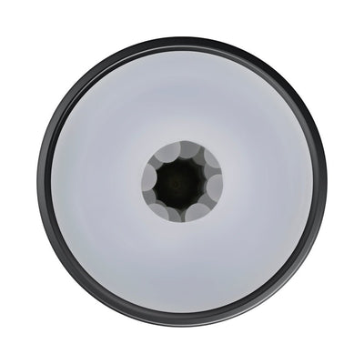 Top-down view of a black canister stroker showing the soft, beaded inner channel designed for textured stimulation.