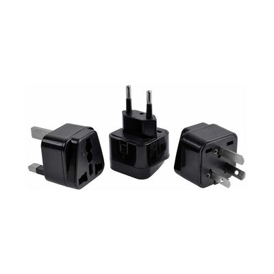 Set of three black international travel plug adapters for use with electronic devices.