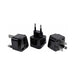 Set of three black international travel plug adapters for use with electronic devices.