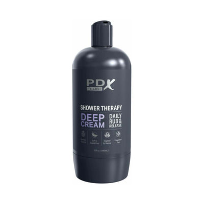 Dark gray discreet bottle labeled PDX Plus Shower Therapy Deep Cream Daily Rub & Release, designed for private use.