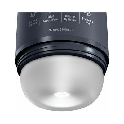 Close-up of the bottom of a dark gray Pdx Plus Shower Therapy Deep Cream Frosted bottle with suction control and fragrance-free label.