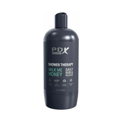 Matte black PDX Plus Shower Therapy Milk Me Honey Light bottle with flip-top cap and minimalist label design.