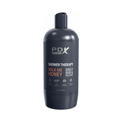 Black discreet bottle labeled PDX Plus Shower Therapy Milk Me Honey Daily Rub & Release, designed for private use.