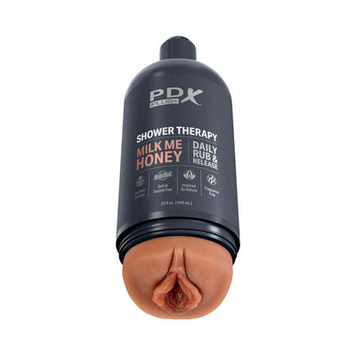 Discreet black shower therapy stroker bottle with realistic skin-tone sleeve and detailed vaginal opening.