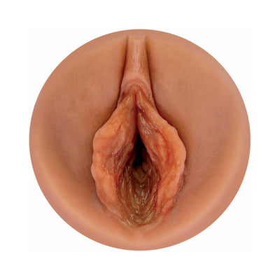 Close-up view of realistic, skin-toned male pleasure sleeve with detailed interior texture.