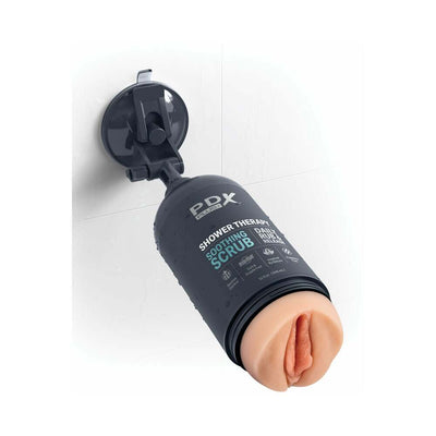 PDX Plus Shower Therapy Soothing Scrub Light stroker with suction cup mounted on a tiled wall.